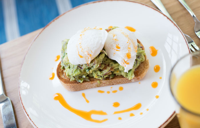 Smashed avocado on toast breakfast from the anglers pub and restaurant teddington