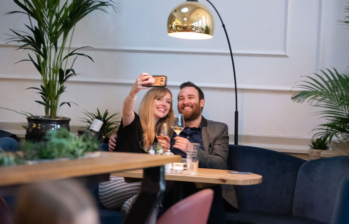 Customers at The Old Bank bar and restaurant on Northcote Road in Battersea