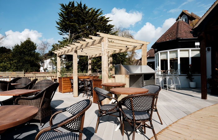 Outdoor terrace at The Bear of Burton pub restaurant and hotel, Dorset, Christchurch.